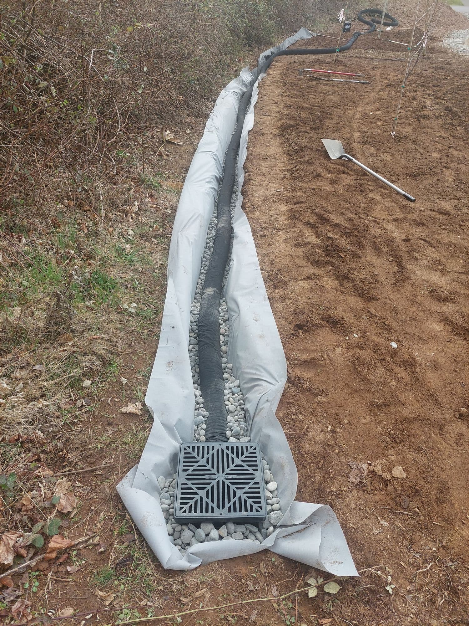 Completed drainage system with landscape restoration