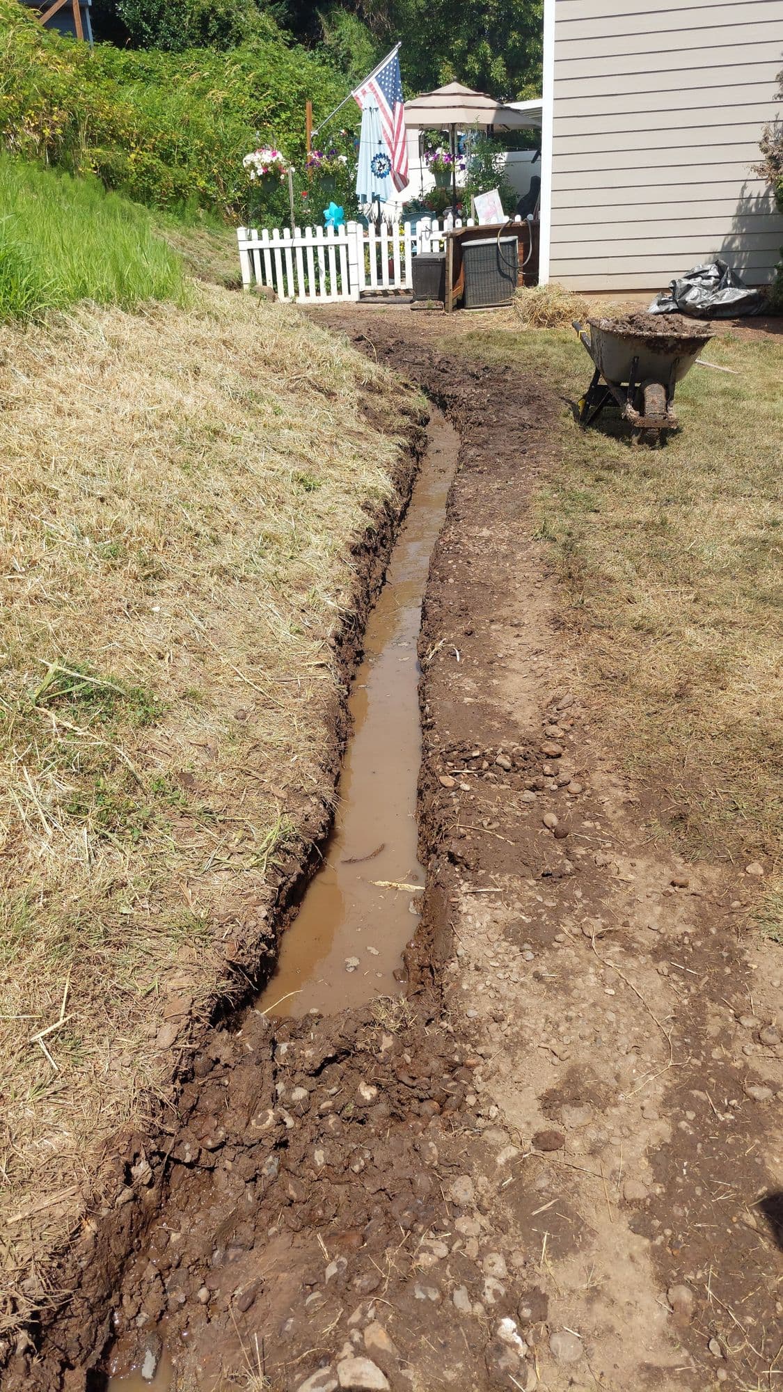Channel drain installation in progress